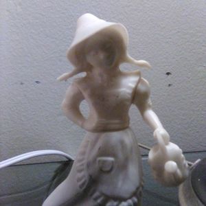 Avon fashion fragrance figurine